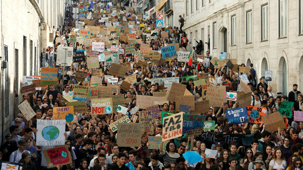 Students around the world march against inaction on climate change